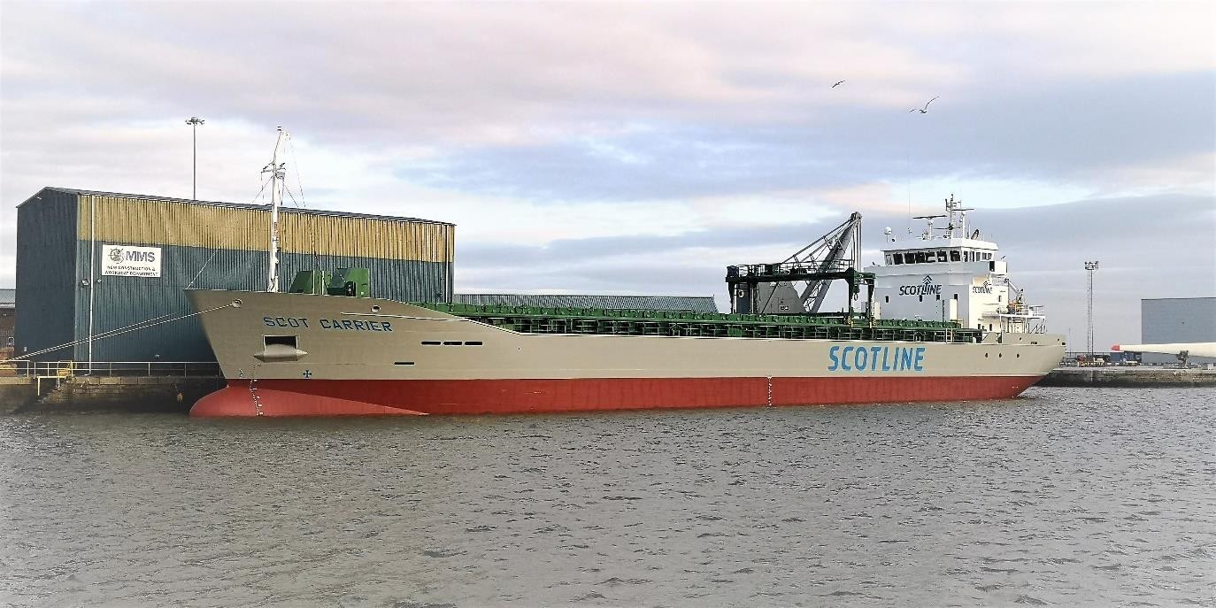 MV SCOT CARRIER transiting Dornoch Firth Coast on the Scottish East Coast  